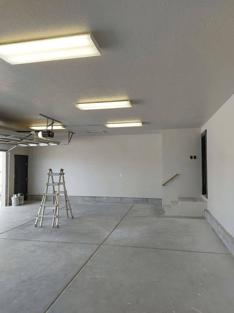 Drywall taping and mudding in progress showing joint compound application and professional finishing work